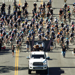 Dozens of bicyclists during parade