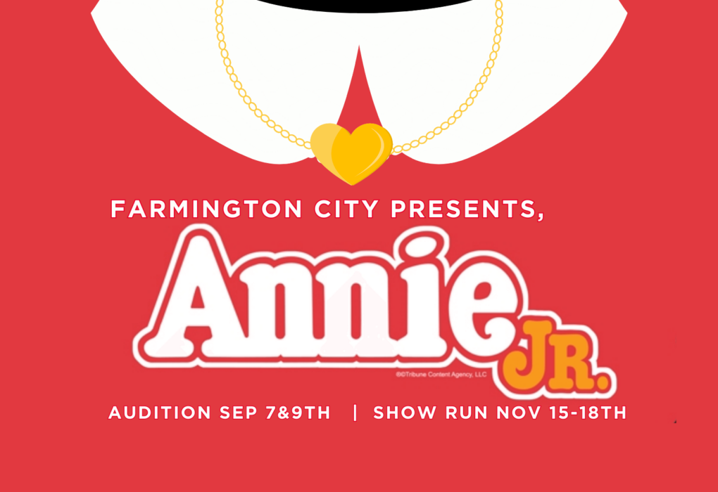 Red Annie Jr Flyer, close up of dress collar and heart shaped necklace