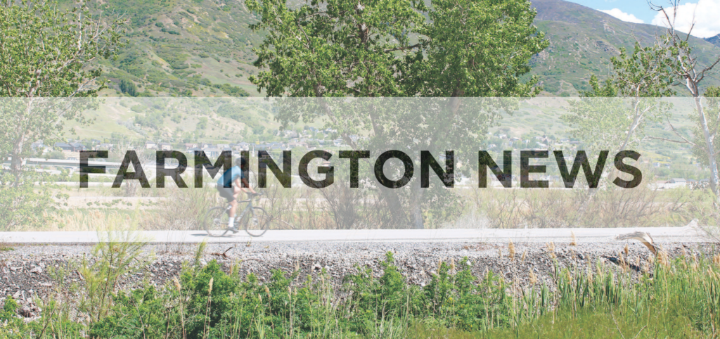 Farmington News, Bike trail with trees and mountain in the background